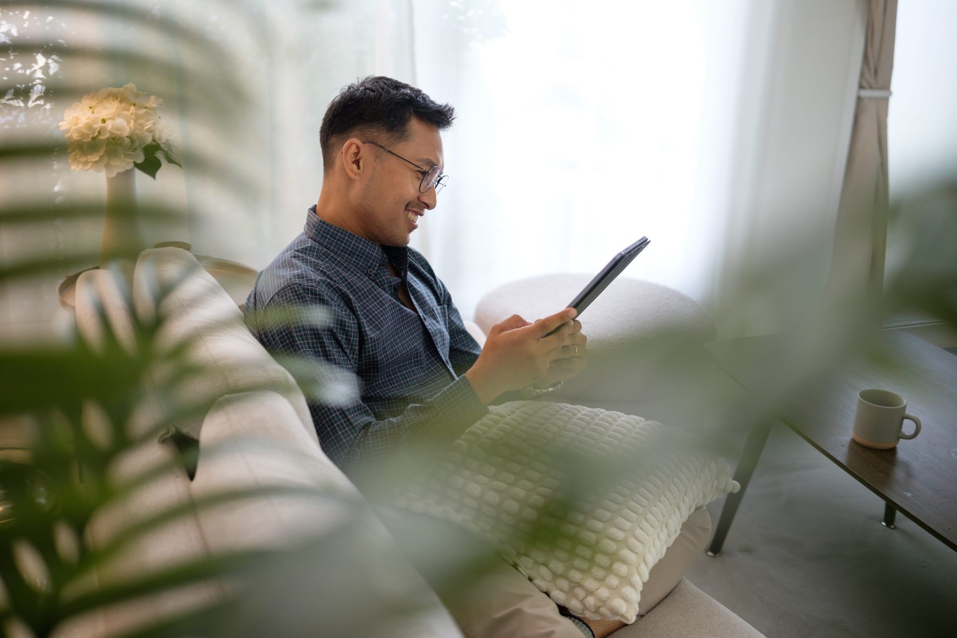 A professional working from a modern furnished apartment